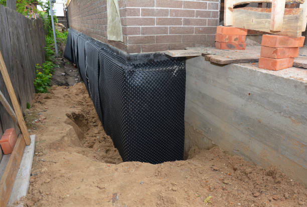 Happy homeowners after waterproofing job in Halethorpe